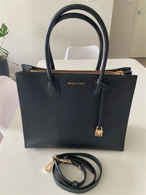 small black michael kors tote bag|michael kors black hand bag.